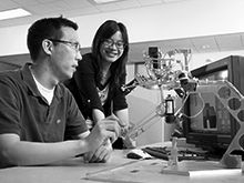 two students in a robotics lab